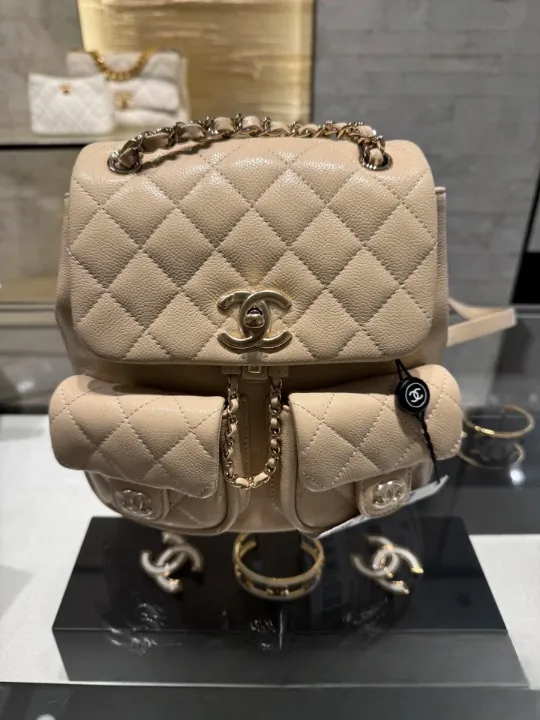 Beige Quilted Twin-Pocket Backpack