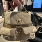 Beige Quilted Twin-Pocket Backpack