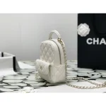 Ivory Quilted Top-Handle Backpack