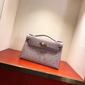 Mauve Ostrich-Embossed Top-Handle Bag