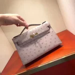 Mauve Ostrich-Embossed Top-Handle Bag