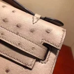 Mauve Ostrich-Embossed Top-Handle Bag