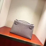 Mauve Ostrich-Embossed Top-Handle Bag